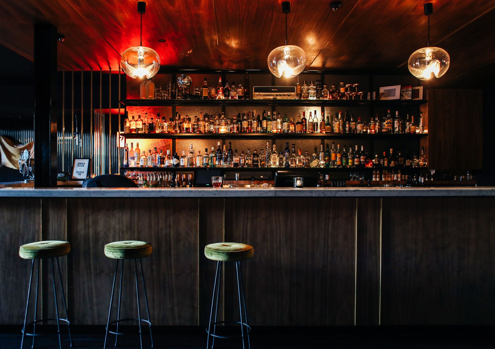 Stylish, dimly lit bar interior