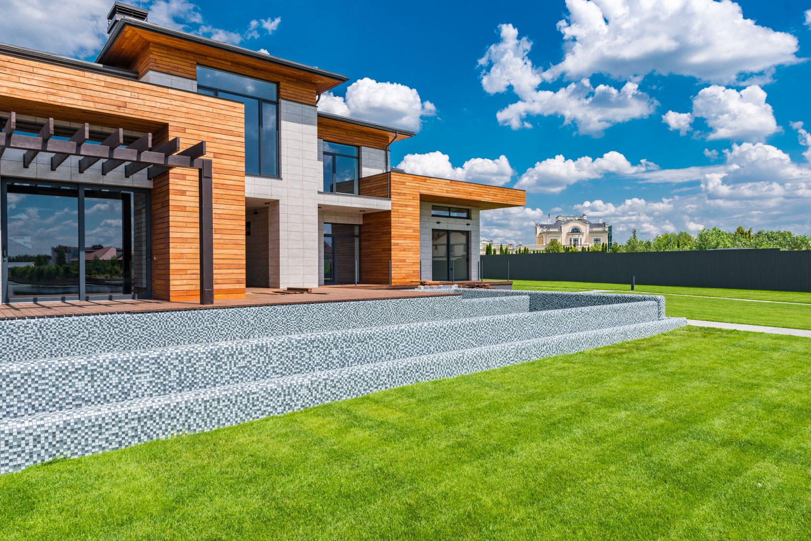 Courtyard of a modern residence with glass walls
